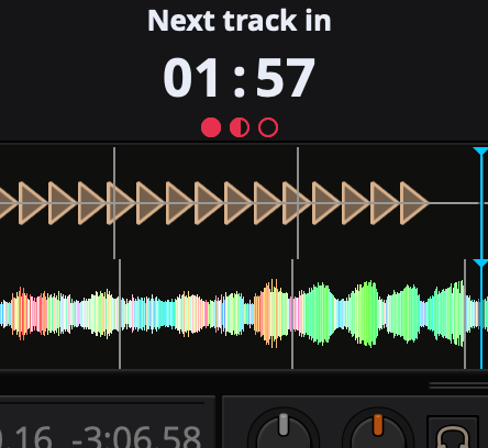 The TangoQ HUD: 'Next track in' above a large countdown, with a row of tanda progress pips below (two filled, one half, one empty).